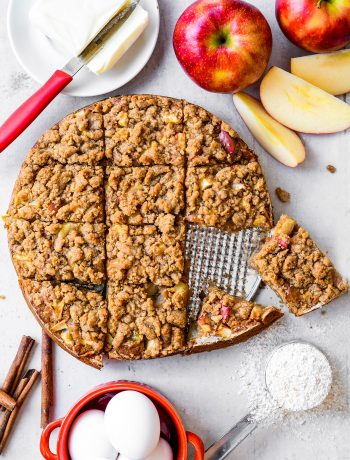top view of apple cake sliced in squares with sliced apples