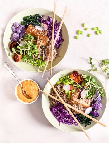 buddah bowls with purple cabbage and tofu with chopsticks