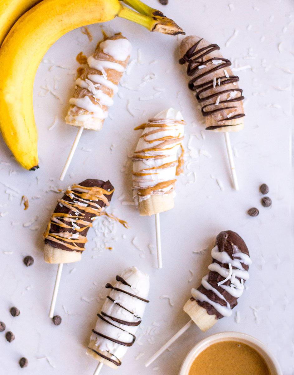 bananas on white background with chocolate drizzle and banana