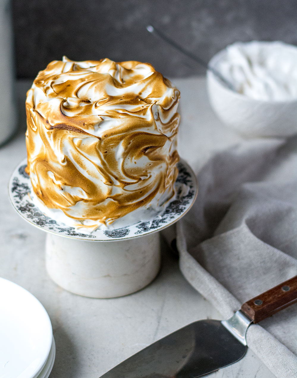 toasted meringue cake on table