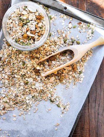 muesli on a baking sheet with scoop
